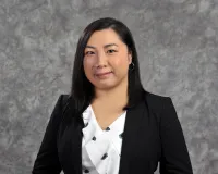Xiao M. Huang