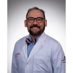 Carlos F Zayas