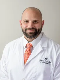 Derek E. Slack