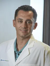 Andrew E Schmutz