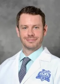 Aaron J Hamann