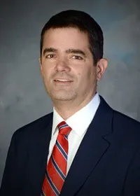 Joel D Miller