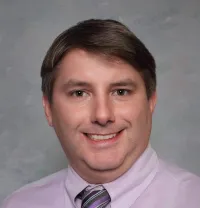 Michael W Straza