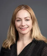 Tara M Cooke