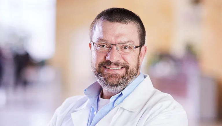 John D. Descher