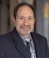 Larry M. Genser