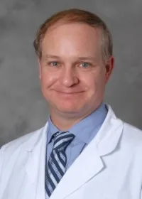 Glenn J Minster
