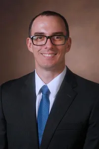 Justin C Hewlett