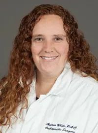 Andrea M White