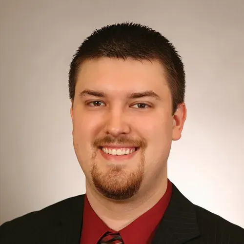 Andrew J Koester