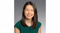 Alina M. Huang