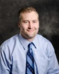 Joel J Holman