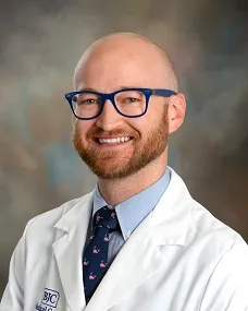 Cameron L Koester