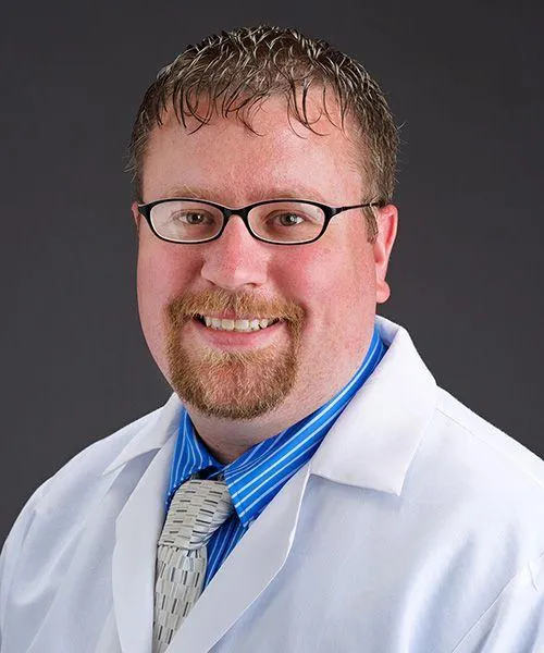 Clayton J Butcher