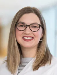 Emily L Lanzola