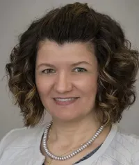 Adelina L Palade