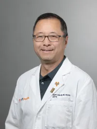 Eugene J Louie-Ng