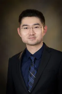 Qiang Wang