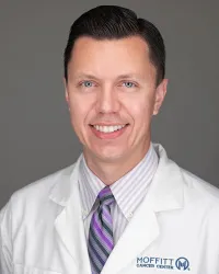 Adam G Winkler