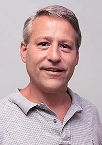 Gregory J Simmons