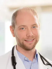 Nathan R Auch