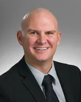 Justin J. Rosenau