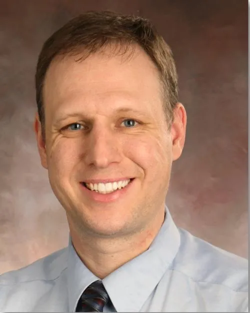 Christopher M Smalley