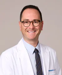 Adam L Isaac