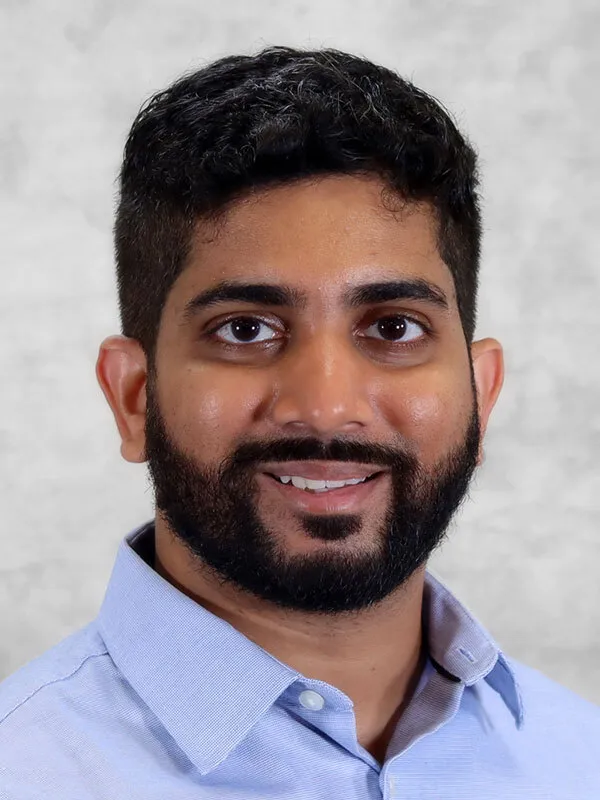 Dr. Vivek M John