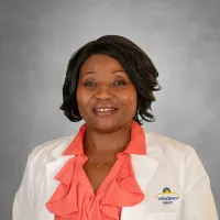 Claudine M Ndasi