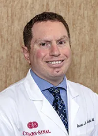 Isaac J Adatto