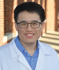 Andrew M. Tom