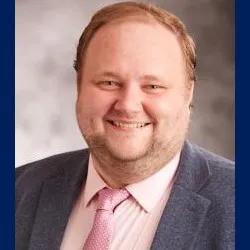 Aaron B Stuber