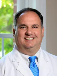Christopher G Economus