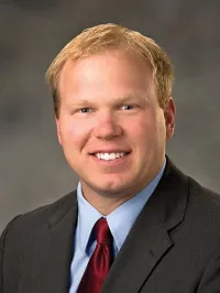 Erik Joseph Sather
