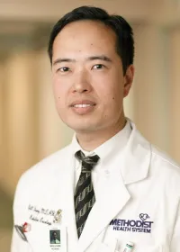 T. William Huang