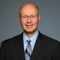 Andrew S Korcek