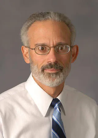 Michael J Econs