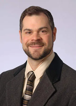 Lawrence A Mark