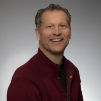 Bradley J Scott
