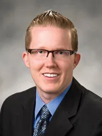 Adam John Riutta
