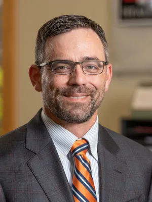 Aaron J Mast