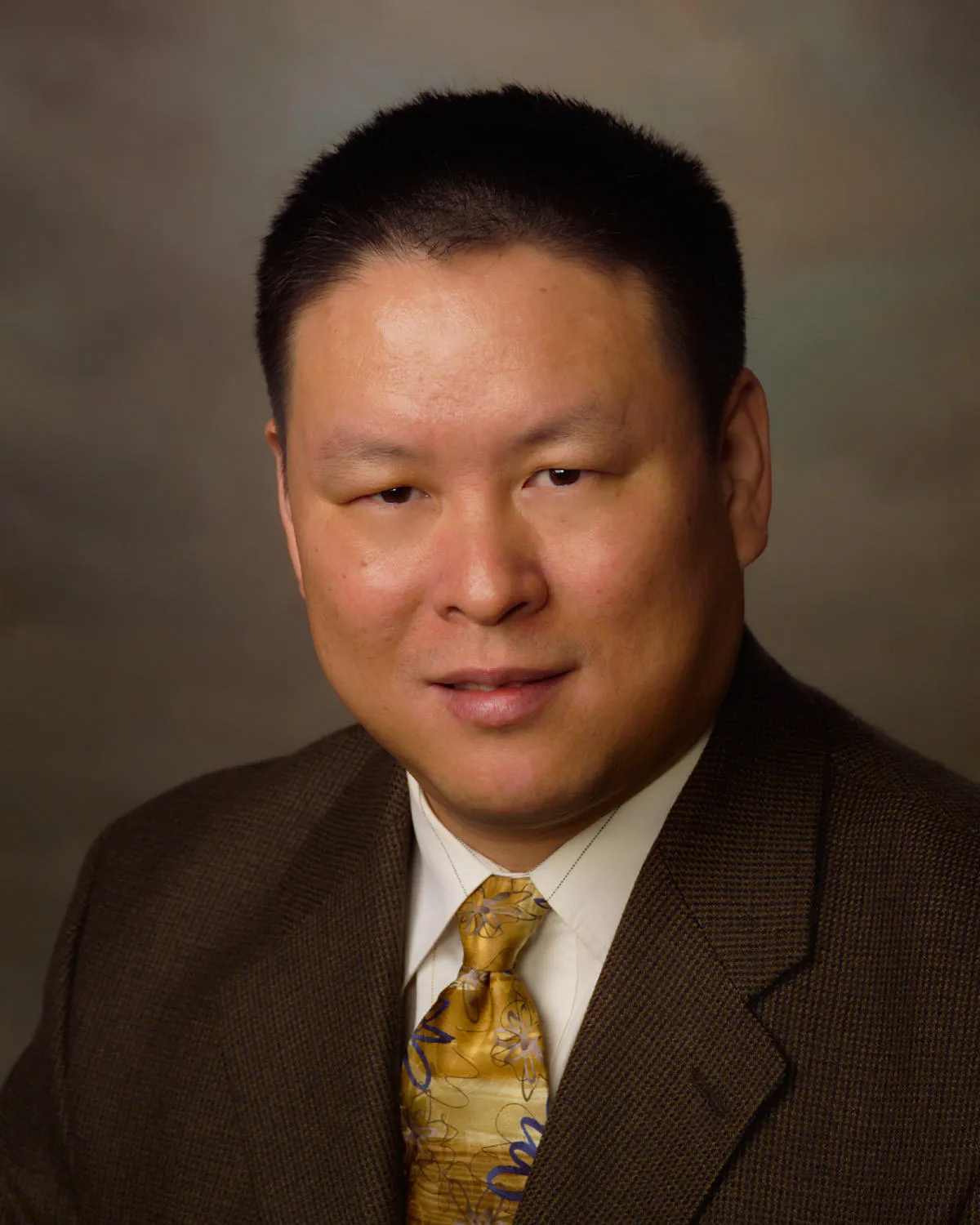 Xinqiang Han
