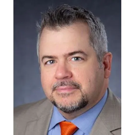 Christopher J Darus