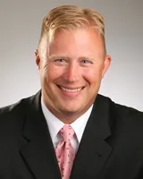 Dr. Travis Matthew Sanger