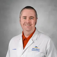 Joshua L Warfel