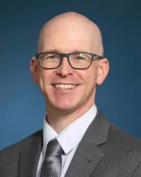 Kyle T Halligan