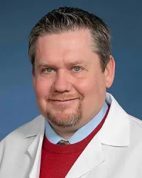 Christopher A Marshall