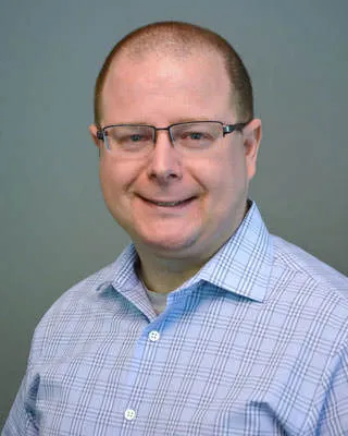 Bradley W Erickson
