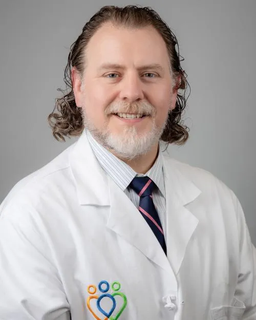 Eric B Kirker
